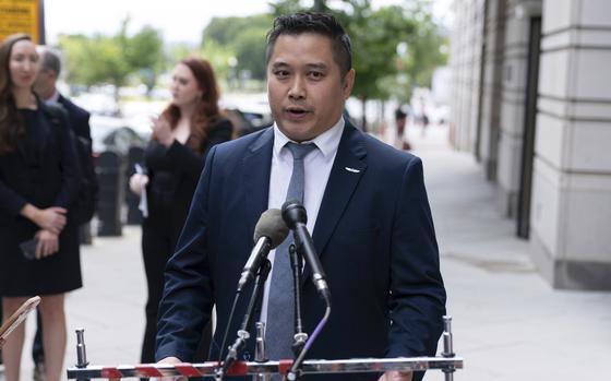 TikTok content creator Paul Tran talks to the press as he leaves the federal courthouse in Washington on Sept. 16, 2024.