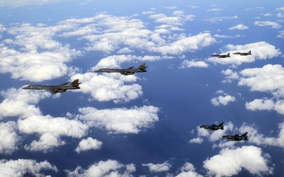 Two U.S. B-1B Lancers are escorted by South Korean 15K Slam Eagles and Japan Air Self-Defense Force Mitsubishi F-2s in airspace between South Korea and Japan, Jan. 15, 2025.