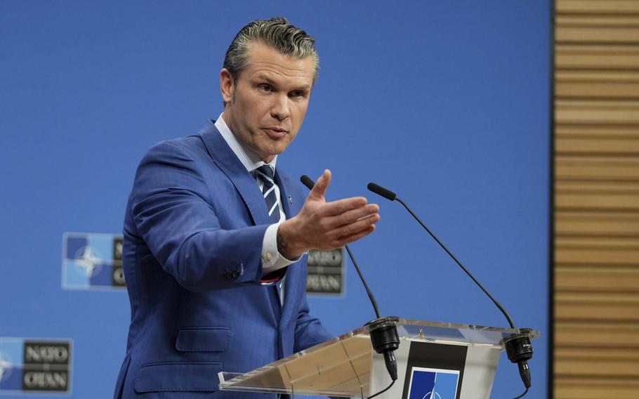 Defense Secretary Pete Hegseth speaks during a media conference at NATO headquarters.