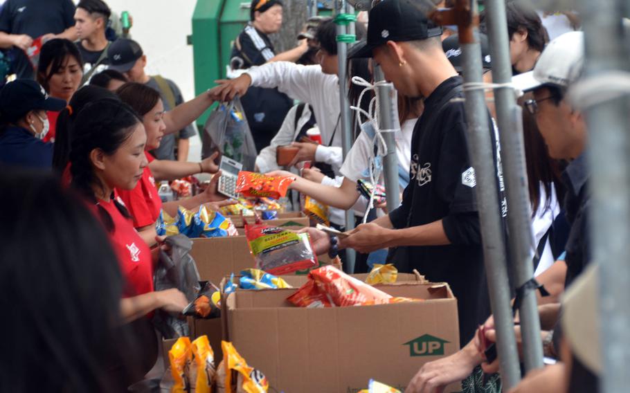 Festival-goers line up for American snacks at Yokosuka Naval Base, Japan, Oct. 6, 2024. 