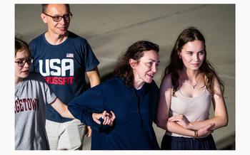 Alsu Kurmasheva, second from right, with her husband, Pavel Butorin, and their daughters Bibi, right, and Miriam at Joint Base Andrews, Md., after Kurmasheva was freed from Russia. 