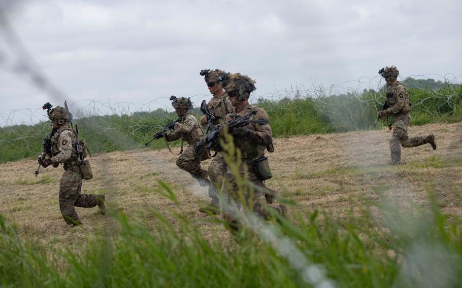 Soldiers assigned to the 101st Airborne Division participate in an air assault demonstration in Carentan, France, on June 2, 2024. Soldiers of the 101st liberated the town 80 years ago after landing by parachute on D-Day. 