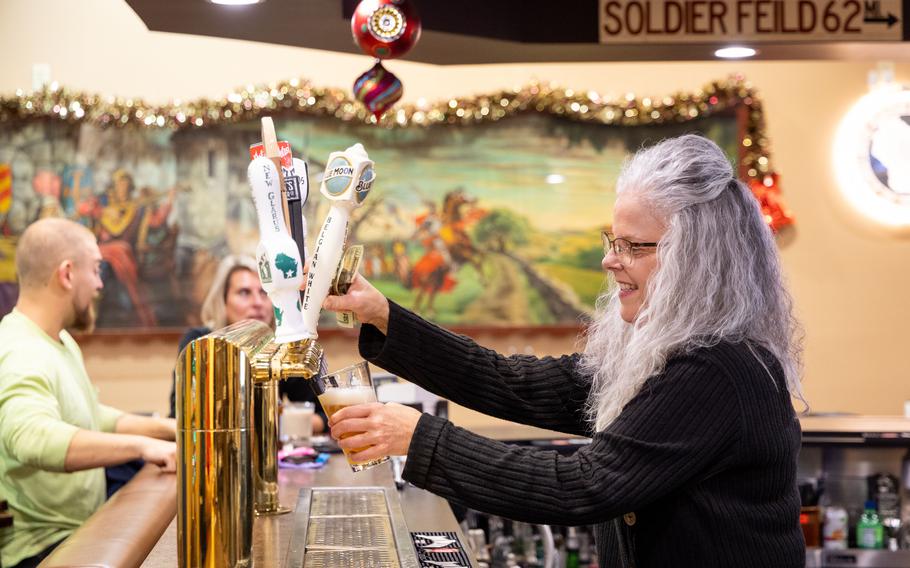 A bartender dispenses a drink at the Mars Cheese Castle’s tavern. 