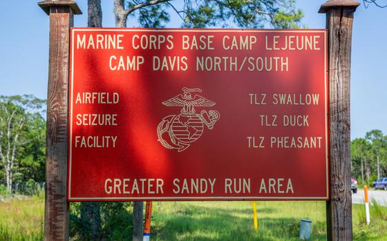 A sign stands at the entrance to Camp Davis North/South in the Greater Sandy Run Training Area on Marine Corps Base Camp Lejeune, North Carolina, Aug. 28, 2023.