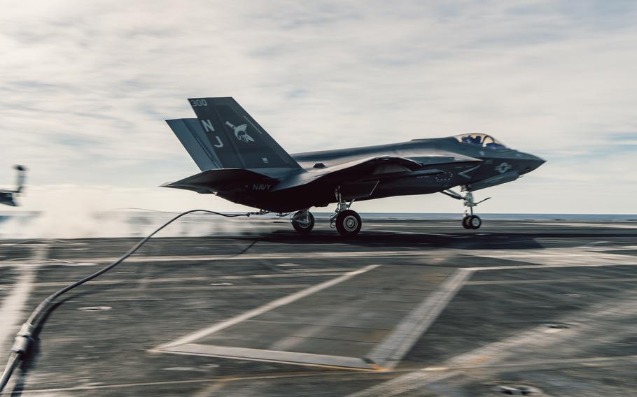 An F-35C Lightning II assigned to Strike Fighter Squadron  147 lands on Nimitz-class aircraft carrier USS George Washington on Dec. 8, 2023. 