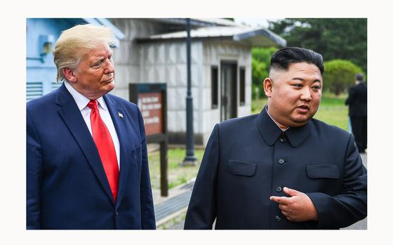 North Korea's leader Kim Jong Un speaks as he stands with U.S. President Donald Trump south of the Military Demarcation Line that divides North and South Korea, in the Joint Security Area of Panmunjom in the Demilitarized zone on June 30, 2019. (Brendan Smialowski/AFP/Getty Images/TNS)