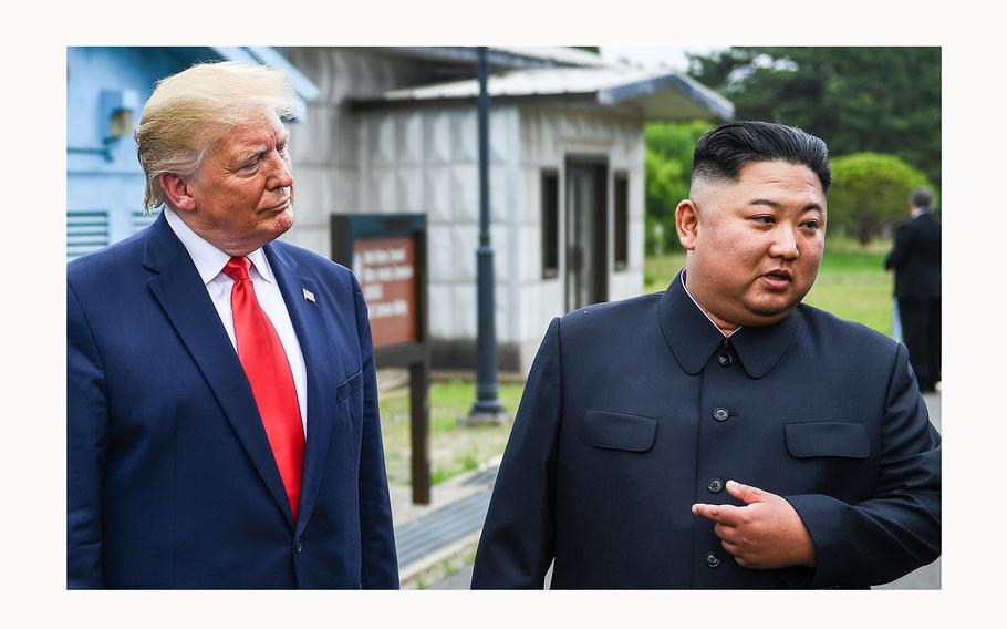 North Korea’s leader Kim Jong Un speaks as he stands with U.S. President Donald Trump south of the Military Demarcation Line that divides North and South Korea, in the Joint Security Area of Panmunjom in the Demilitarized zone on June 30, 2019.