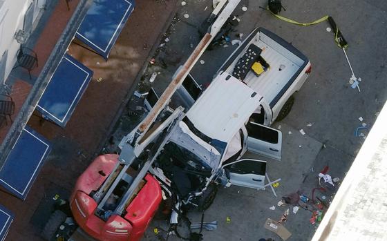 An aerial view of the damaged pickup truck that was used to attack a crowd in New Orleans. 