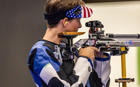 Army Sgt. Sagen Maddalena looks through her sight during the women's 10-meter air rifle final at the 2024 Paris Olympics on Monday, July 29, 2024, at the Chateauroux Shooting Centre in Chateauroux, France.