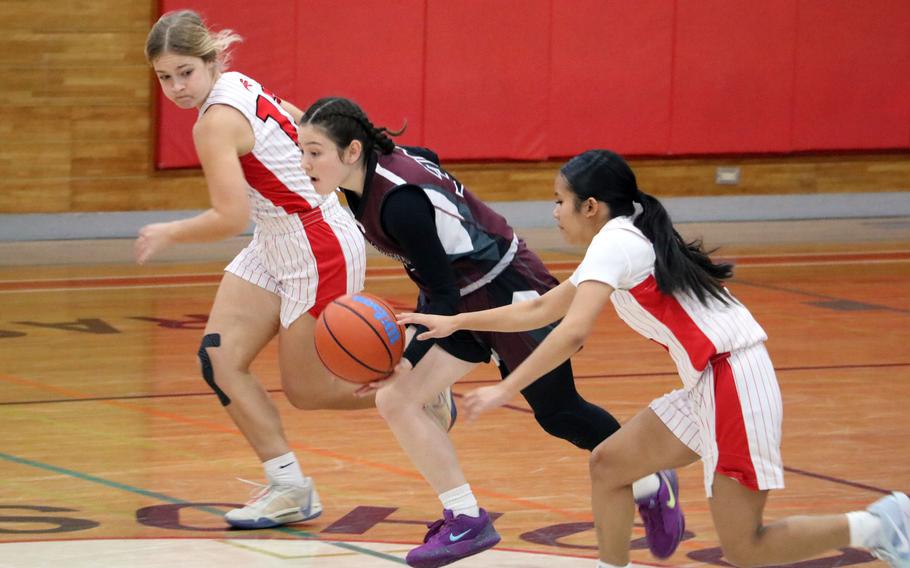 Priscilla Ramirez leads a chase for the ball.