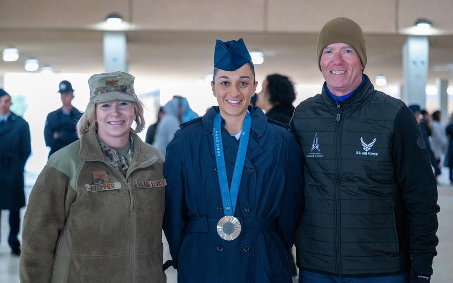 Col. E. Jonelle Eychner, Commander, Air Force Services Center, and Dale Filsell, Chief of the World Class Athlete Program, pose for a photo