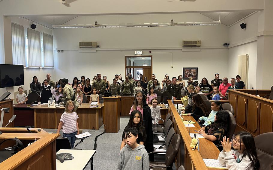 Attendees rise as the jury enters with a verdict in the mock trial of Luke Skywalker in the 8th Judicial Circuit courtroom at Rose Barracks in Vilseck, Germany, on May 20, 2024. 