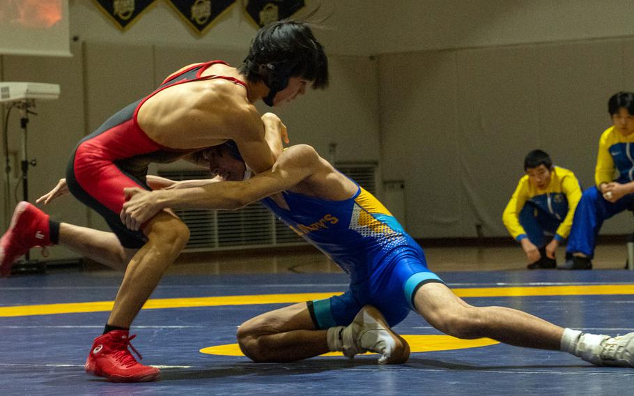 Joah de la Cruz and Hugo Miyamoto battle on the mat.