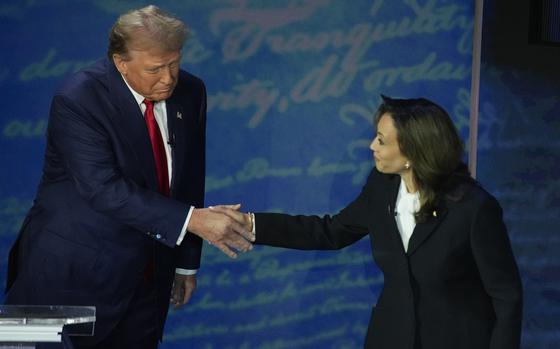 Republican presidential nominee former President Donald Trump shakes hands with Democratic presidential nominee Vice President Kamala Harris during an ABC News presidential debate at the National Constitution Center, Tuesday, Sept.10, 2024, in Philadelphia. (AP Photo/Alex Brandon)