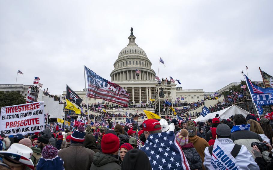 People attack the U.S. Capitol in Washington, on Jan. 6, 2021.