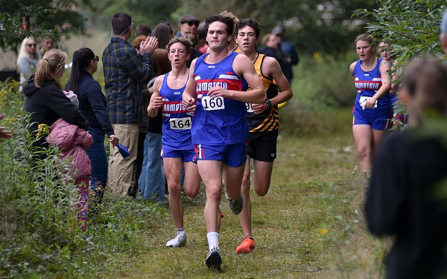 Ramstein's Spencer Jackson, center forefront, leads fellow Royal Adden Lowe and Stuttgart's Ethan Cohen during a cross country meet on Sept. 14, 2024, at Ramstein High School on Ramstein Air Base, Germany.