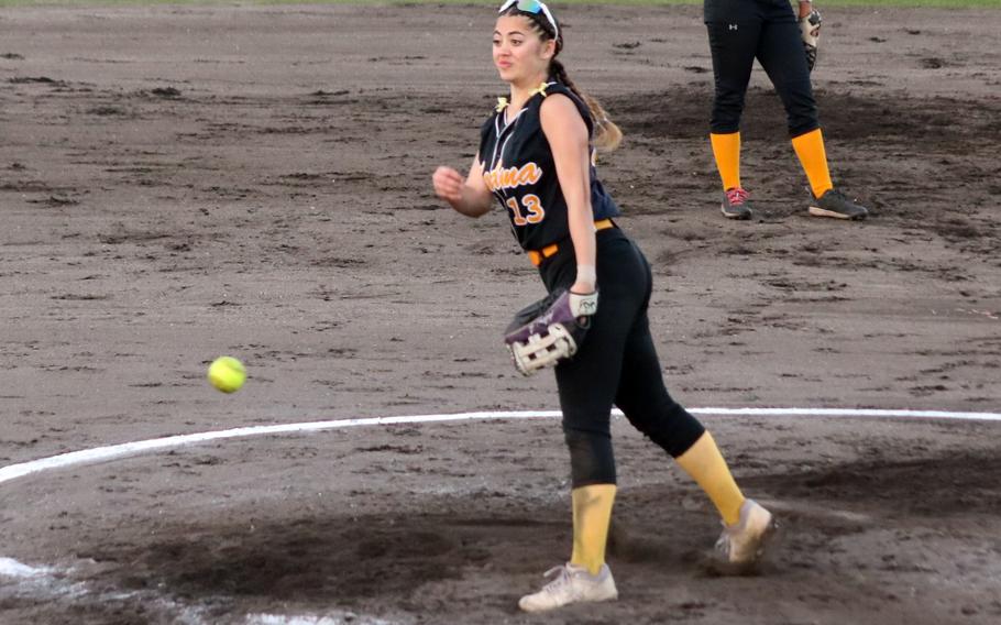 Aubree Leidig pitches.