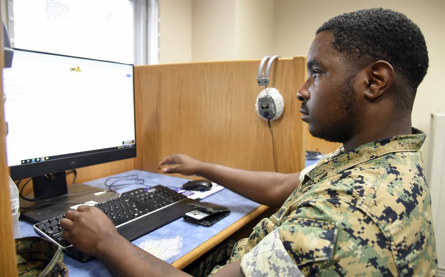 Pfc. Myron Dewberry, a Marine stationed at Combined Arms Training Center Camp Fuji, Japan, signs up to take University of Maryland Global Campus classes, July 12, 2024. 