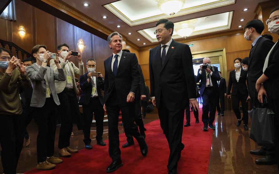 U.S. Secretary of State Antony Blinken, left, walks with China's Foreign Minister Qin Gang in Beijing on June 18, 2023.