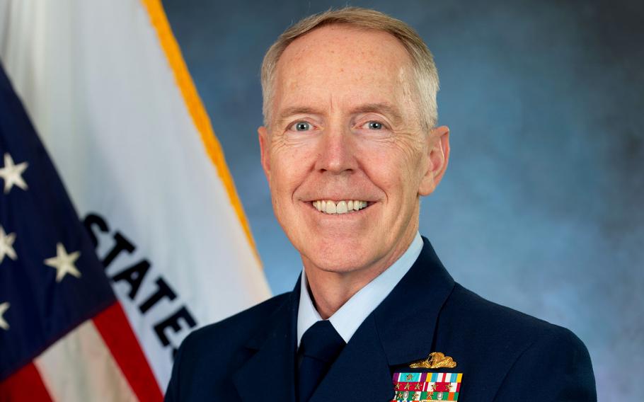 A portrait of a smiling Coast Guard commandant.