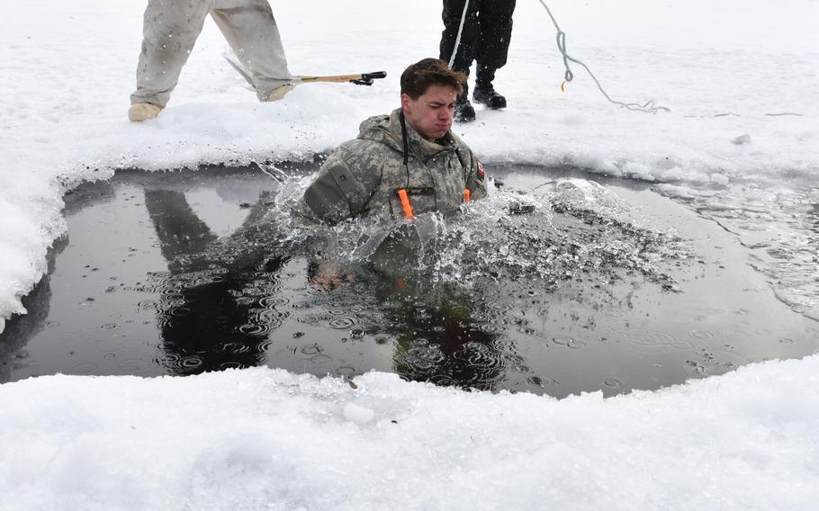 An airman participates in a cold-water immersion