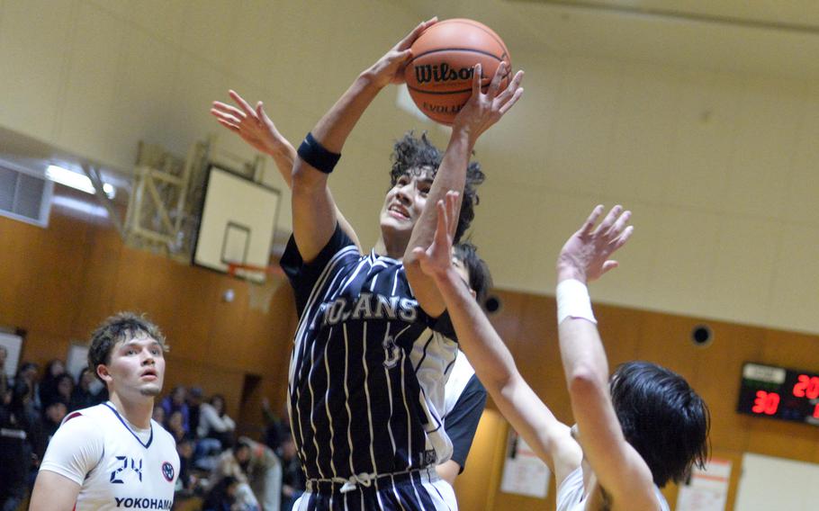 Asher Jorgensen goes up for a contested shot.