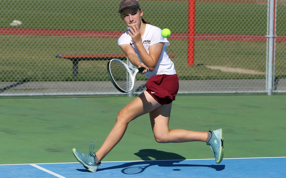 Elizabeth Shoop hits the ball.