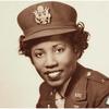 A black-and-white photo of a woman in a 1940s Army nurse uniform.