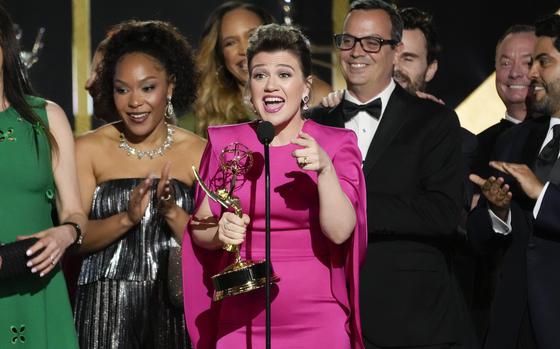 Kelly Clarkson, center, and the team from “The Kelly Clarkson Show” accept the award for Outstanding Daytime Talk Series during the 51st Daytime Emmy Awards on June 7 at the Westin Bonaventure in Los Angeles.  The sixth season of the show, which has won 22 Daytime Emmy Awards, launched Sept. 23. 