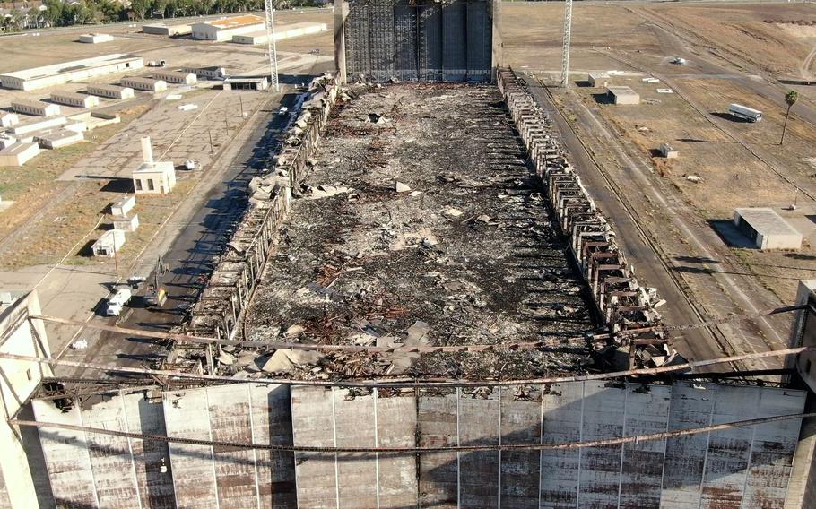 The ruins of the North Hangar at the former Marine Corps Air Station Tustin soon after the Nov. 7 fire. The metal doors have since been lowered to the ground, but the concrete pillars still stand.