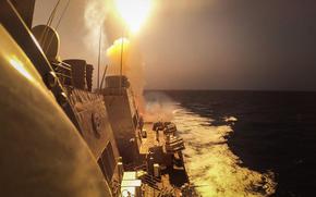 The destroyer USS Carney defeats a combination of Houthi missiles and drones in the Red Sea in October 2023, according to the Navy. 