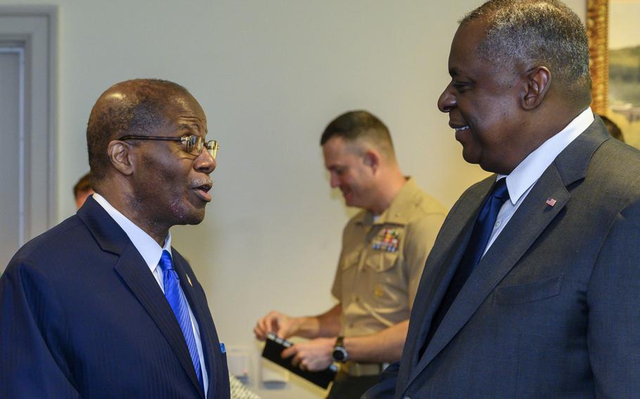 Secretary of Defense Lloyd J. Austin III speaks with Under Secretary of Defense for Intelligence and Security Ronald Moultrie at the Pentagon in Washington on June 1, 2021. Moultrie testified in a House hearing on Capitol Hill on Friday, June 11, that DOD intelligence agencies are overhauling efforts to combat foreign influence and disinformation campaigns.