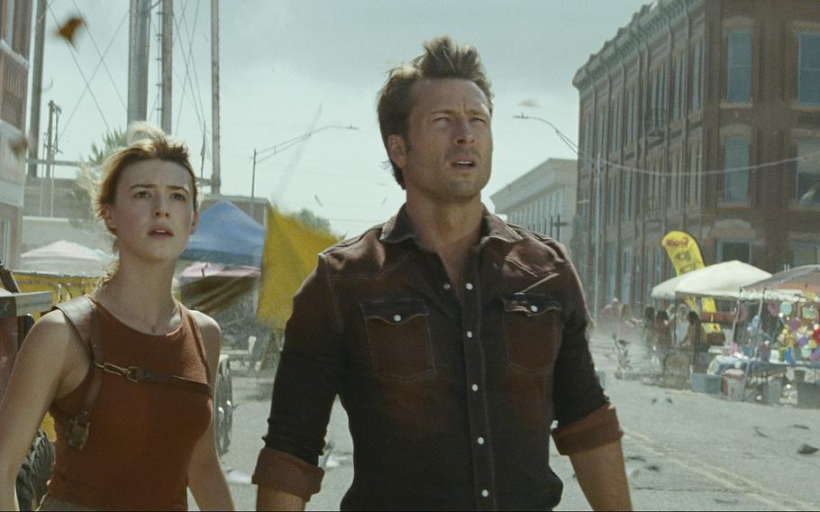 Glen Powell, right, and Daisy Edgar-Jones star in “Twisters.” 