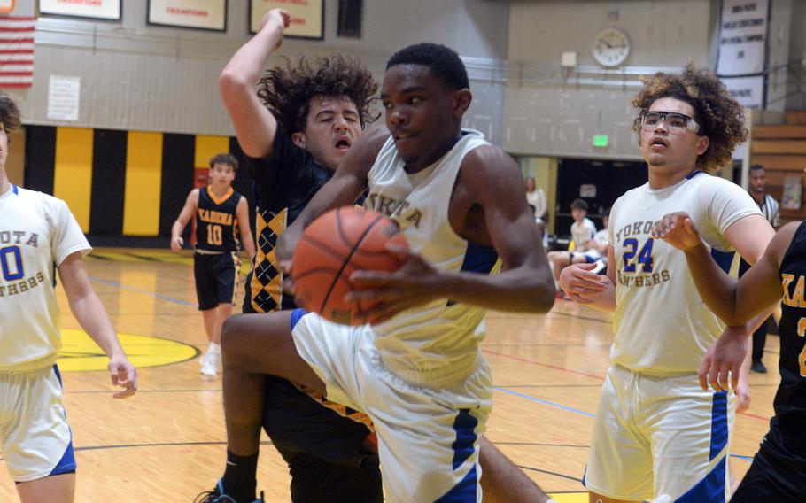 Baron Reed grabs a rebound.