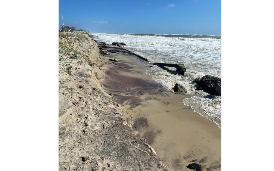 A popular stretch of Outer Banks beach has been closed after storm erosion dug up “potentially hazardous” remnants of a secretive U.S. military site dating to the Cold War.