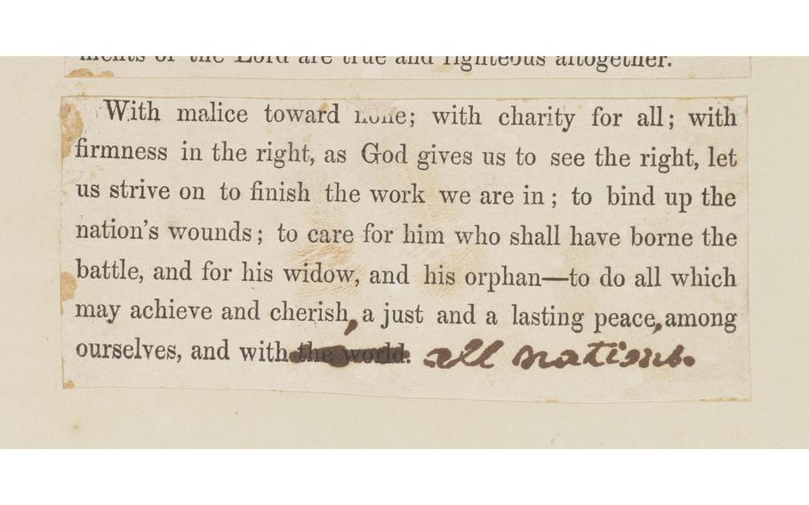 A piece of paper with typed text from Lincoln’s speech, with the last word scratched out and all nations written in to replace it.