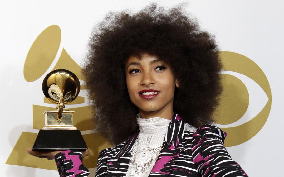 Esperanza Spalding poses backstage with the award for best new artist at the 2011 Grammy Awards on Feb. 13, 2011, in Los Angeles.