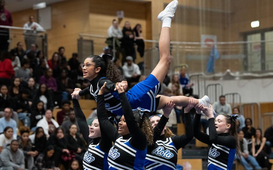 Nyla Cortes surfs along her teammates.