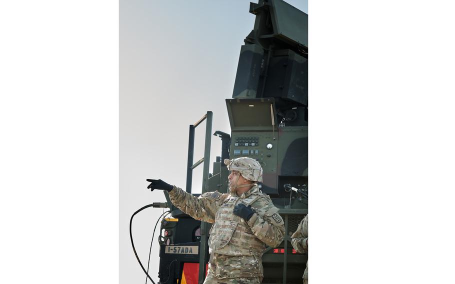 U.S. Army Col. Hailey Bairu directs soldiers’ attention to a potential defensive position