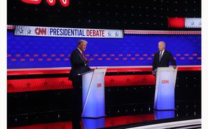 President Joe Biden and former President Donald Trump face off during their first presidential debate at CNN, on June 27, 2024, in Atlanta. (Jason Getz/The Atlanta Journal-Constitution/TNS)