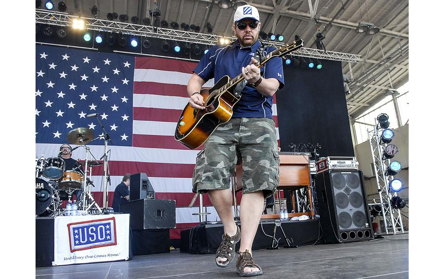 Toby Keith on stage at Wiesbaden Army Airfield, Germany, on May 25, 2007. Keith entertained Americans from all over Germany, following his return from a tour in Iraq and Afghanistan.