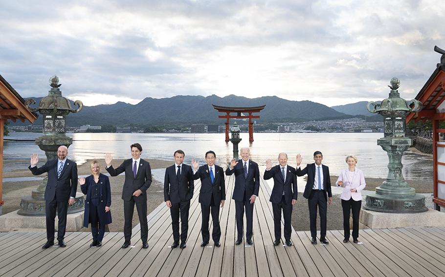 From left, European Council President Charles Michel, Italian Premier Giorgia Meloni, Canada’s Prime Minister Justin Trudeau, French President Emmanuel Macron, Japanese Prime Minister Fumio Kishida, U.S. President Joe Biden, German Chancellor Olaf Scholz, British Prime Minister Rishi Sunak and European Commission President Ursula von der Leyen pose for the family photo at the Itsukushima Shrine in Hiroshima, western Japan, Friday, May 19, 2023.