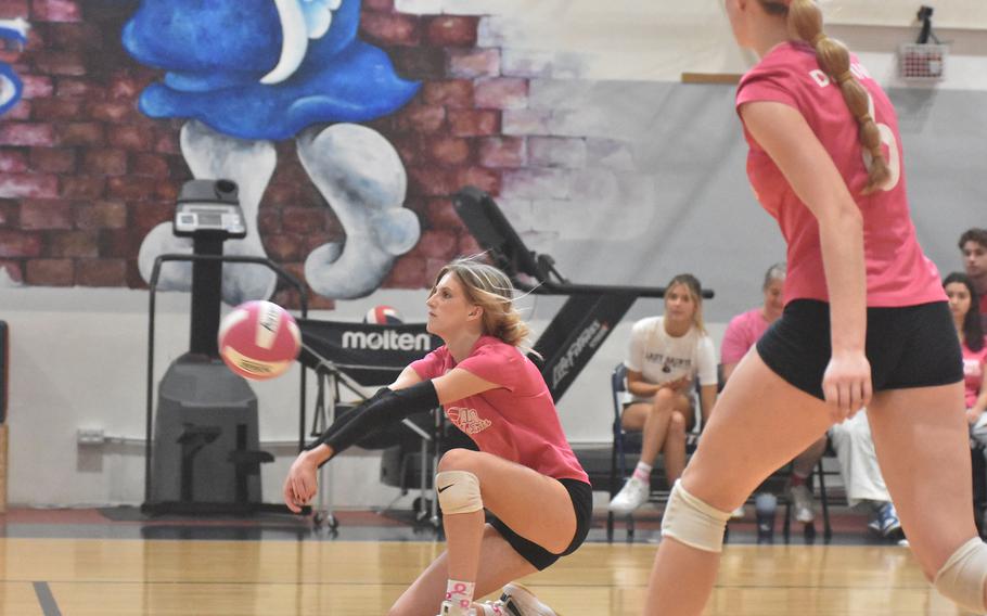 Aviano’s Jaycee Spence digs the ball to set up the Saints’ attack Saturday, Oct. 14, 2023, in a match against Rota at Aviano Air Base, Italy.