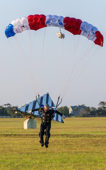 Sgt. 1st Class Jeshua Stahler of the U.S. Army Parachute Team lands his parachute 