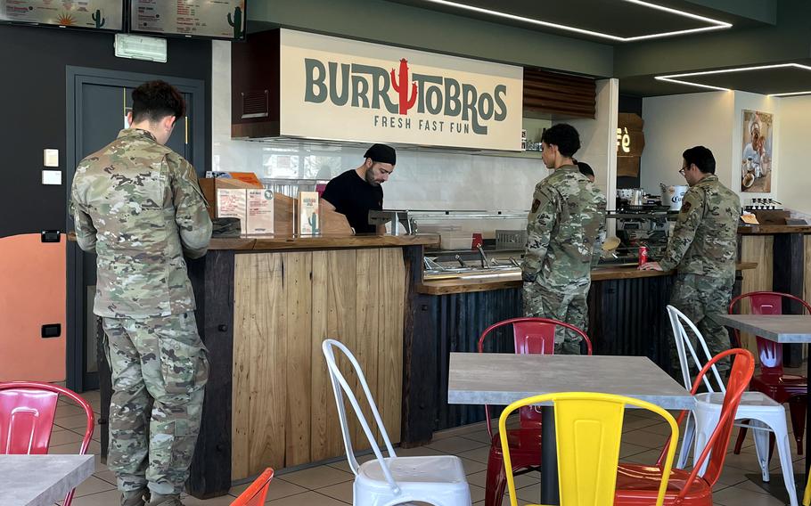 Customers at a burrito restaurant in Aviano, Italy.