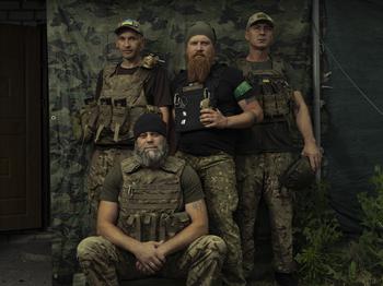 Soldiers of a mortar unit of the Bureviy National Guard brigade, from left: Maly, junior sergeant; Sasha, division engineer; Bohdan, unit commander; and Vitaly, radio operator of the unit. 