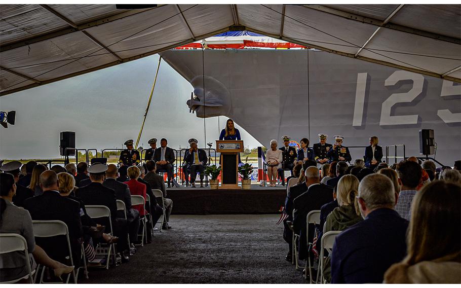 Meredith Berger, the acting under secretary of the Navy, speaks during the christening ceremony for the future Jack H. Lucas (DDG-125) in Pascagoula, Miss., on March 26, 2022. Lucas, the first Flight III guided-missile destroyer that will be equipped with the most advanced technology and weapons systems, was accepted by the Navy on Tuesday, June 27, 2023.