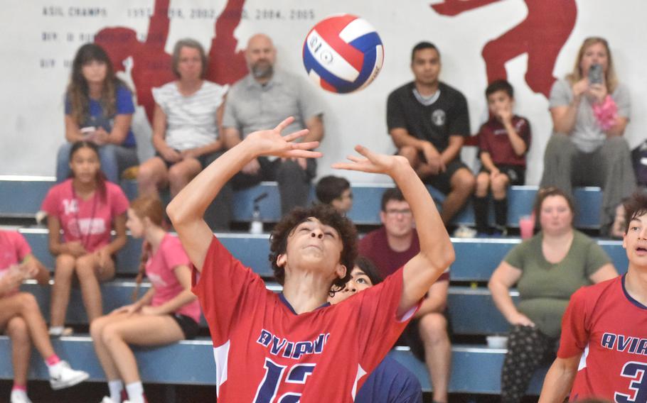 Aviano’s Kaleb Nunez sets the ball back towards his teammates Saturday, Oct. 14, 2023, in the Saints’ four-set victory over the Rota Admirals.