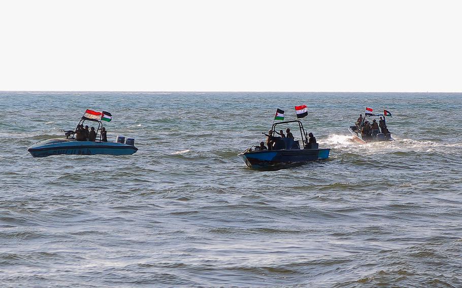 Members of the Yemeni Coast Guard affiliated with the Houthi group patrol the sea as demonstrators march through the Red Sea port city of Hodeida in solidarity with the people of Gaza on Jan. 4, 2024, amid the ongoing battles between Israel and the militant Hamas group in Gaza.