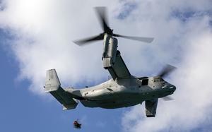 A Marine Corps MV-22B Osprey recovers a casualty from a simulated crash site off the coast of Okinawa, Jan. 22, 2025.